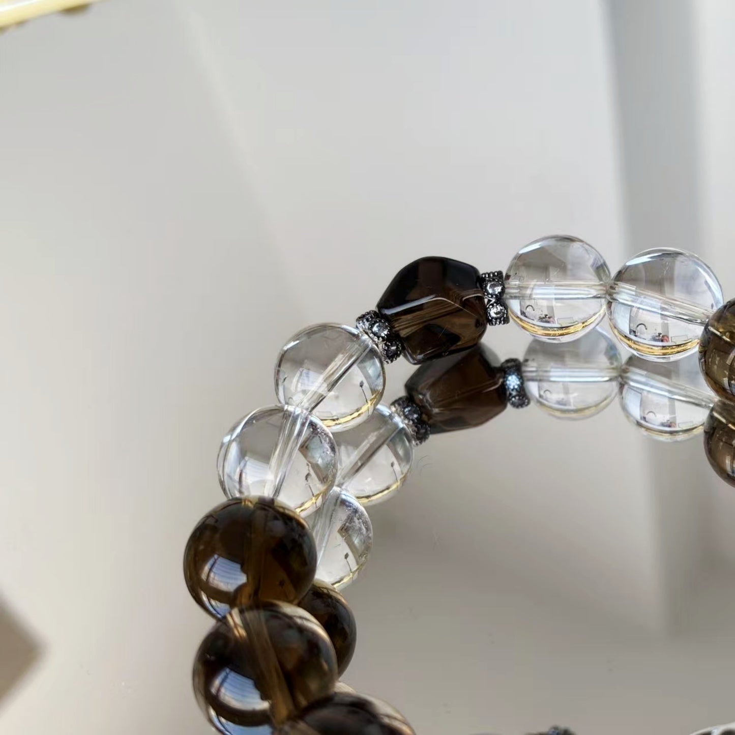 "ROOTED IN LIGHT" – SMOKY CRYSTAL & CLEAR CRYSTAL BEADED BRACELET